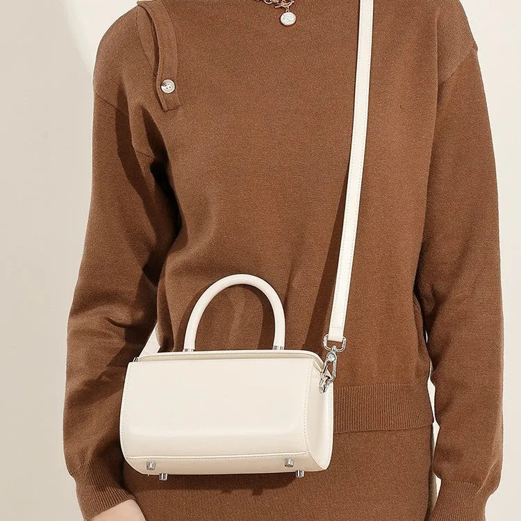 Leather women's crossbody bag with clamshell design in urban simplicity style