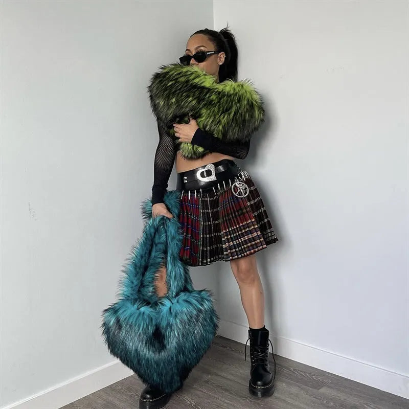 Women winter fleece heart shape crossbody bag with plush exterior, tassel detail, and large capacity