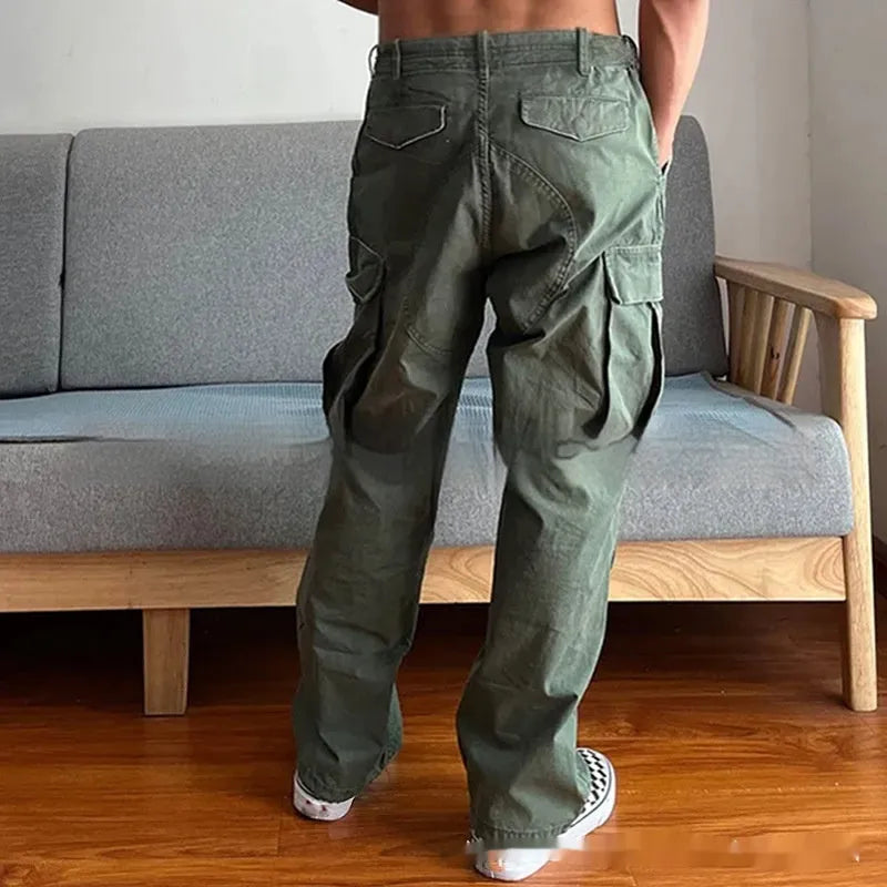 Men's army green washed cotton paratrooper trousers with large pockets, mid waist and zipper fly, sizes S to XXL