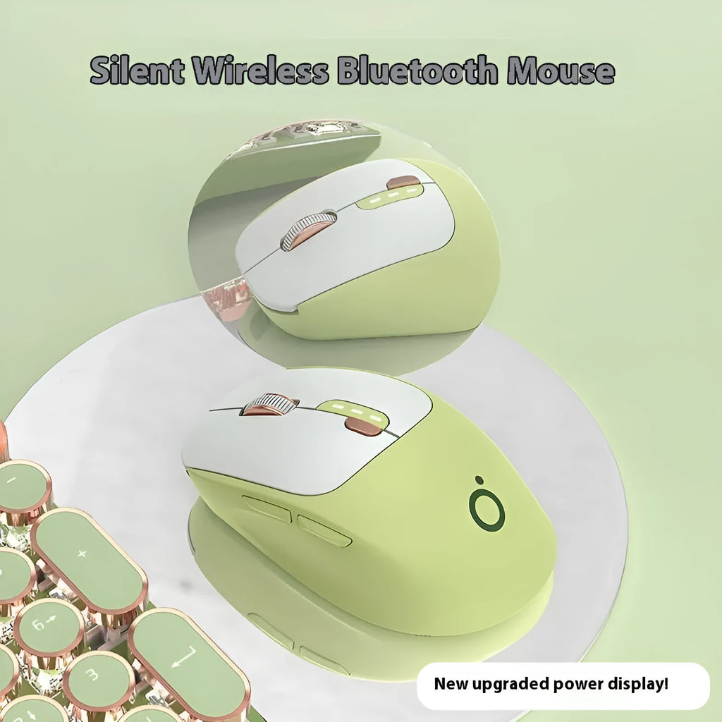 Compact mute wireless Bluetooth mouse in matcha green colour on a wooden desk