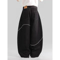 Black straight-leg denim trousers with micro-elastic waist and zip fly closure