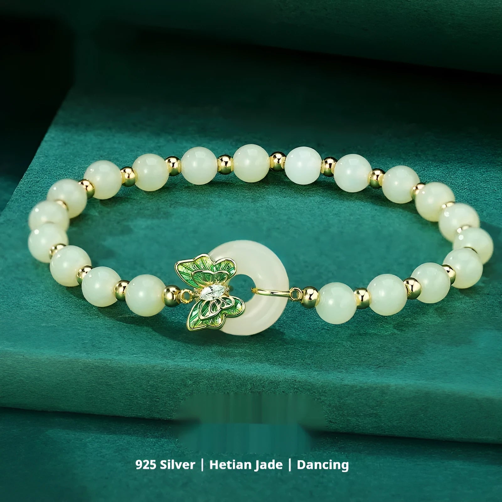 Cyan Hetian jade bracelet with sterling silver butterfly design and gemstone inlays on wrist