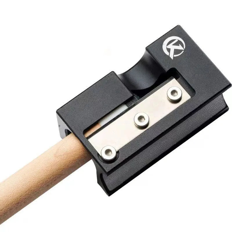 Matte black all-metal billiard cue leather tip repair tool on pool table