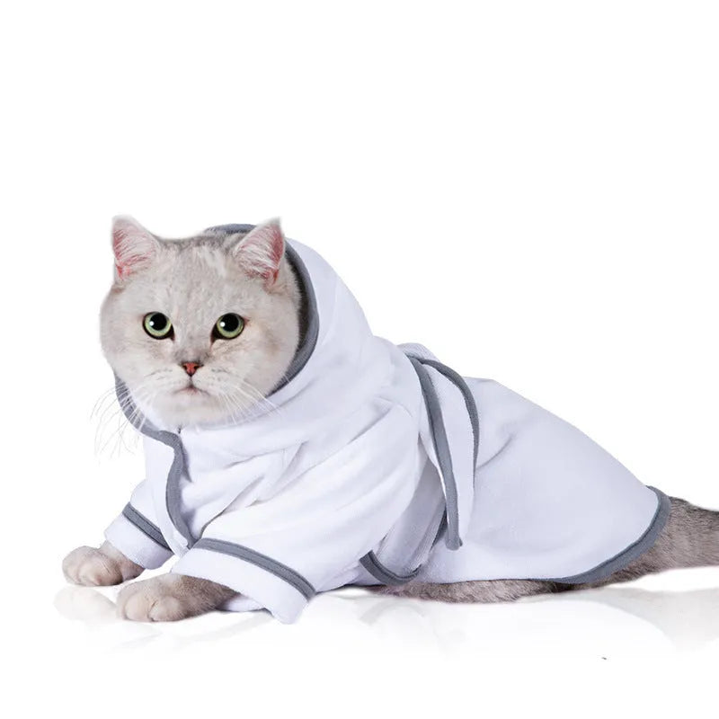 Grey absorbent four-legged pet bathrobe for dogs and cats, soft fabric with full body coverage on a small dog