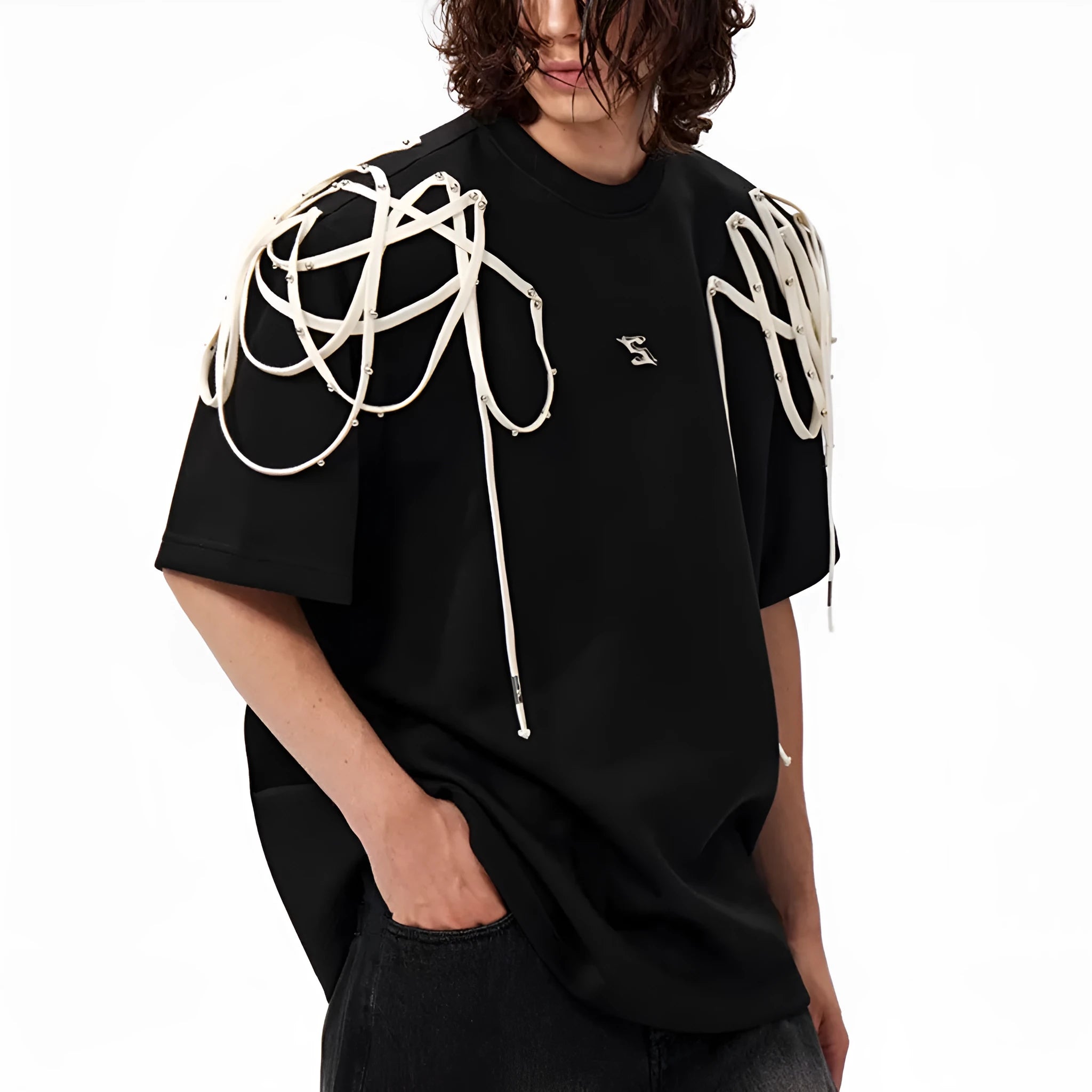 Black loose fit short sleeve t-shirt with padded shoulders and decorative rivet ribbon detail.