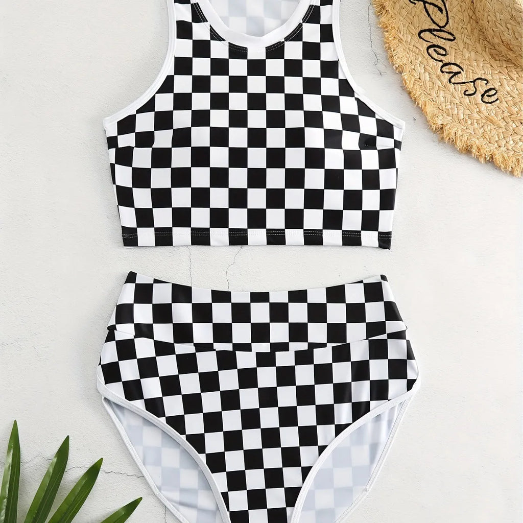 Women's black and white checkerboard racing one-piece swimsuit with backless design and suspender straps