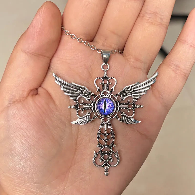 Geometric devil wings and cross pendant necklace in alloy, shown in a choice of blue, green, purple, red, or yellow colour finishes.