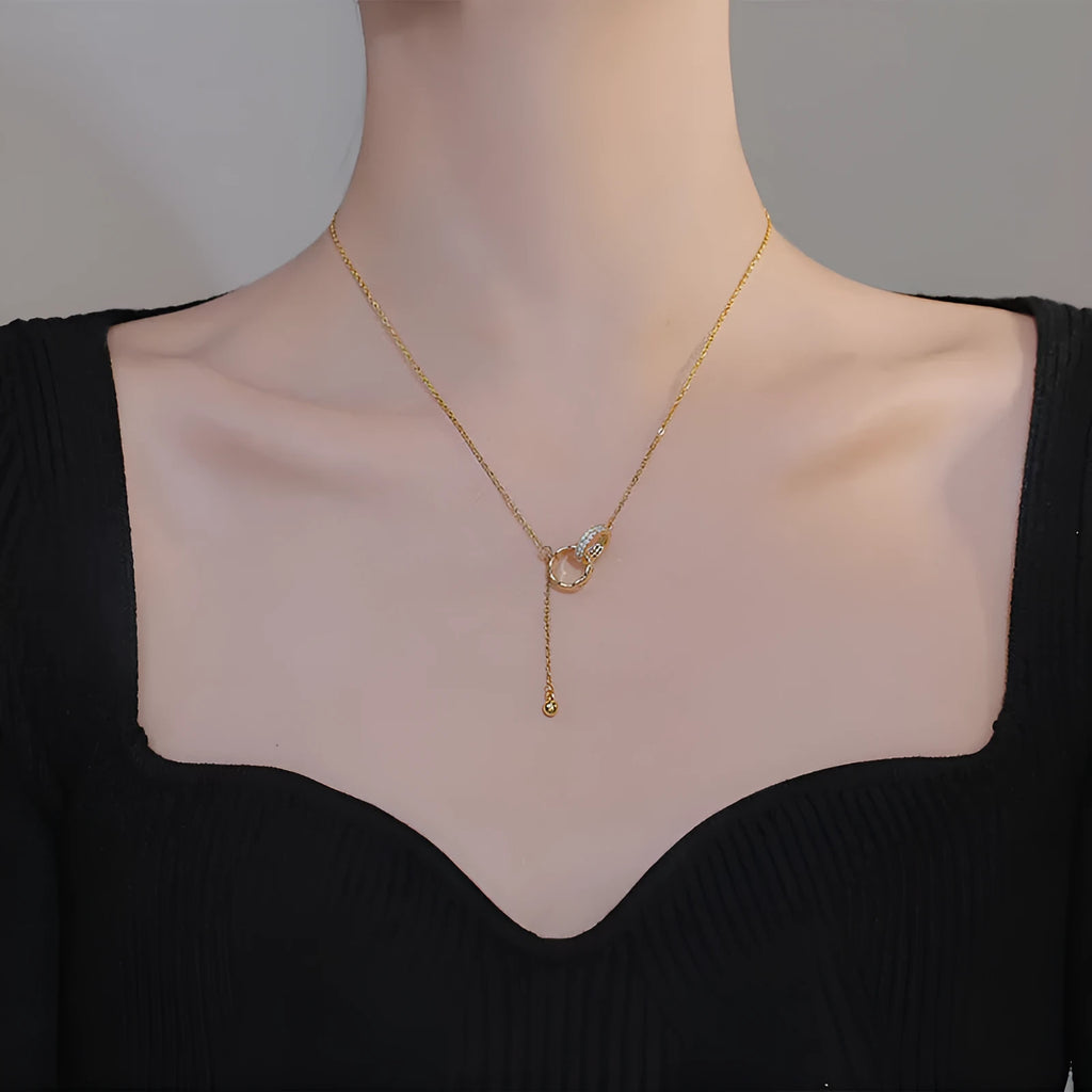 Titanium steel tassel clavicle chain necklace with double ring pendant in gold or silver finish