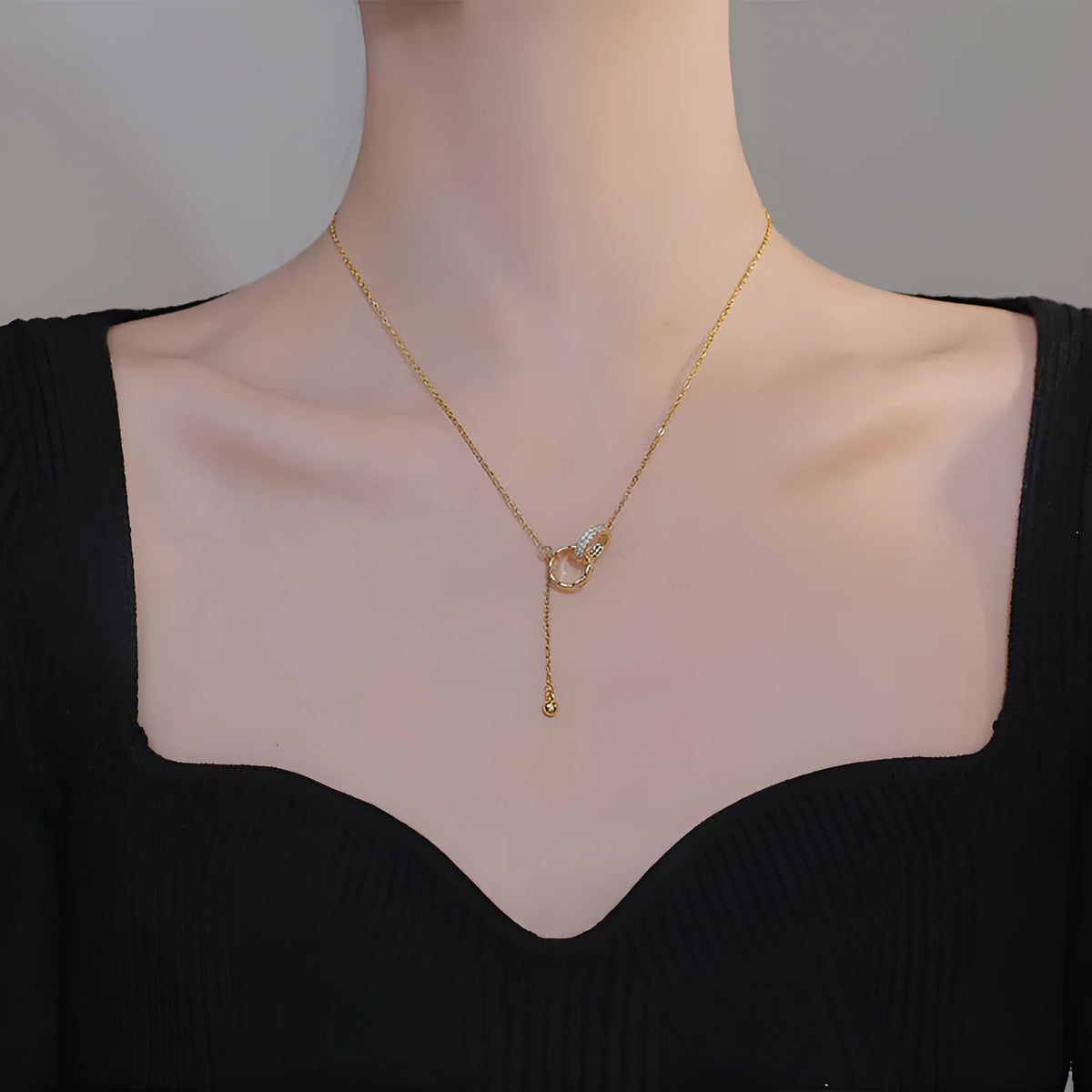 Titanium steel tassel clavicle chain necklace with double ring pendant in gold or silver finish
