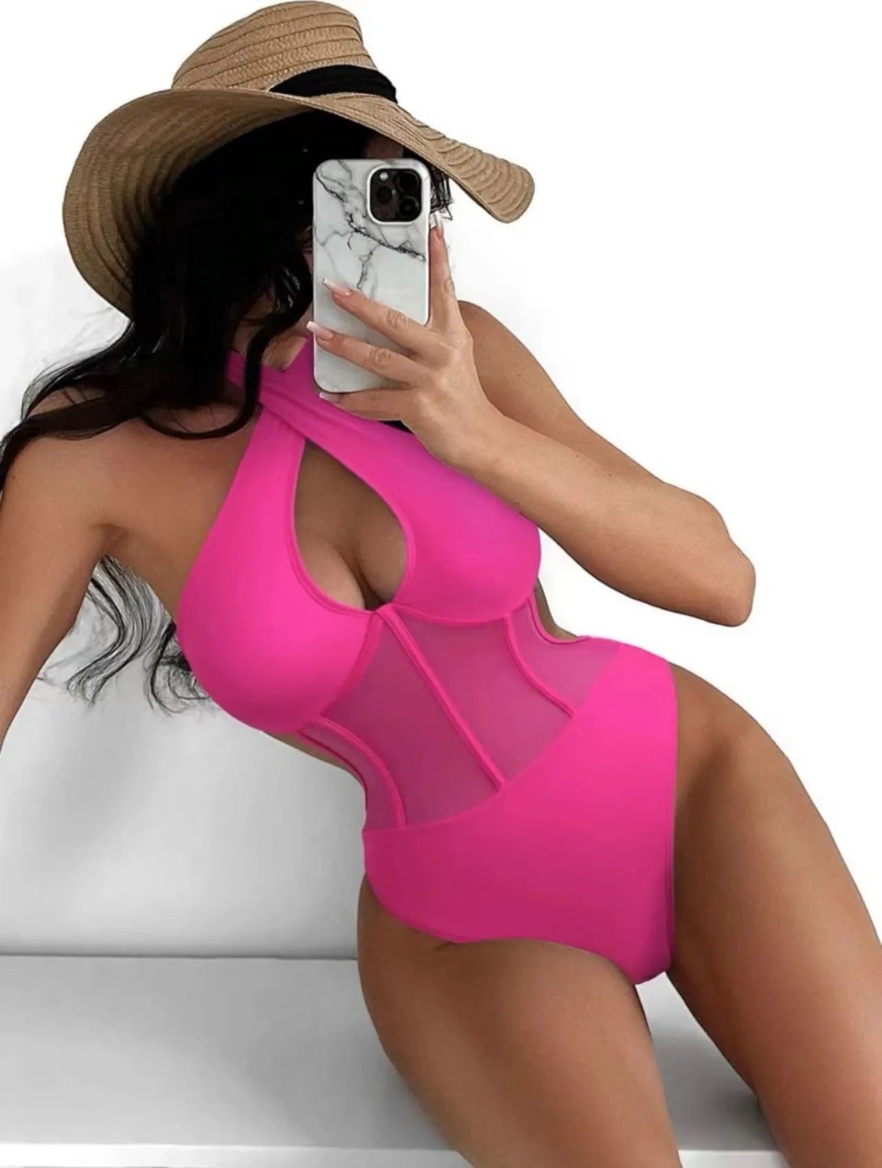 Women's black one-piece swimsuit with spun yarn nylon and spandex fabric on a mannequin.