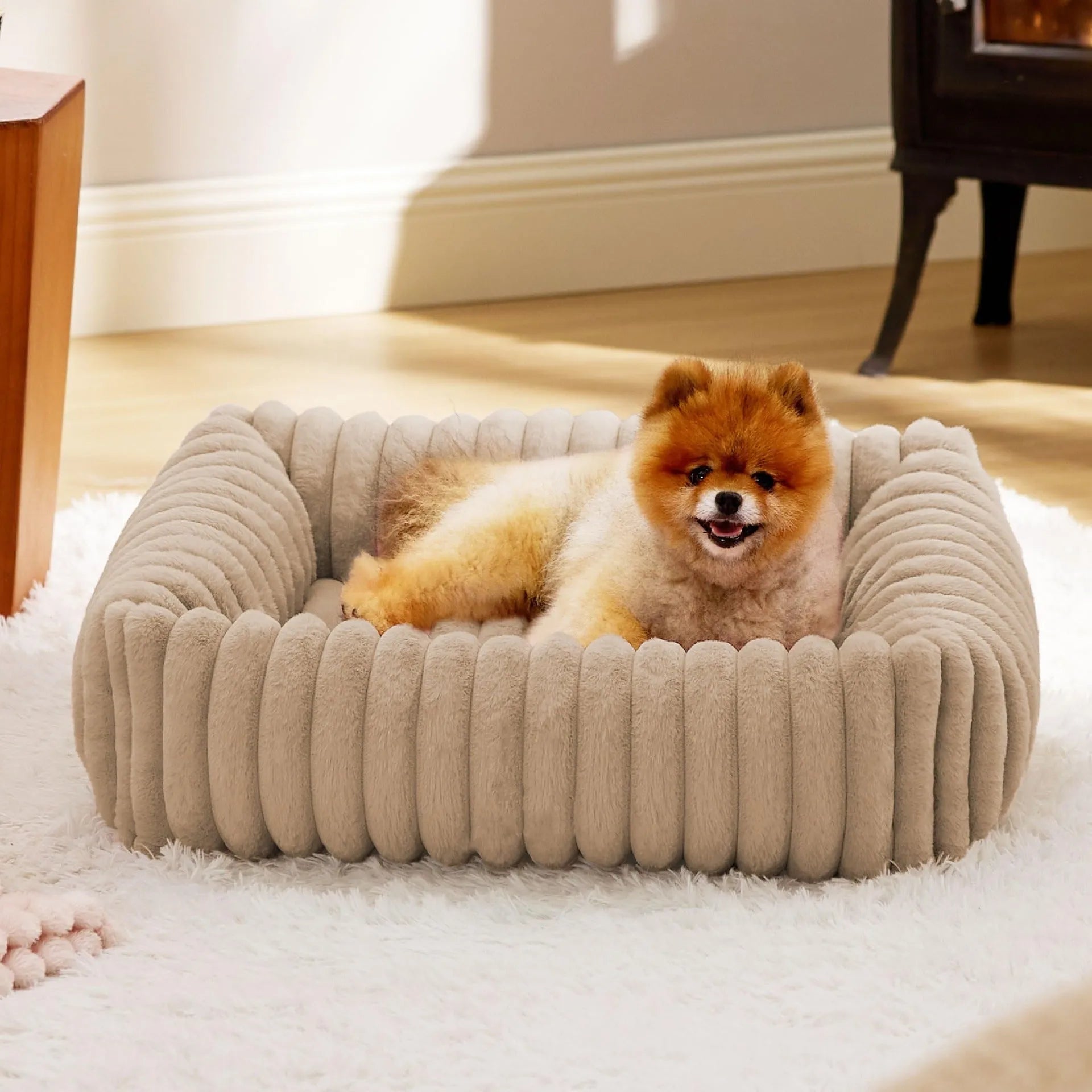 Raised-edge pet dog cat bed cushion in beige, shown in a large size with high sides.