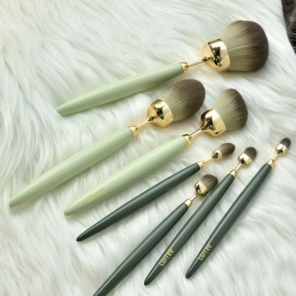 BA 7-piece makeup brush set with beech wood handles and soft bristles on a clean surface