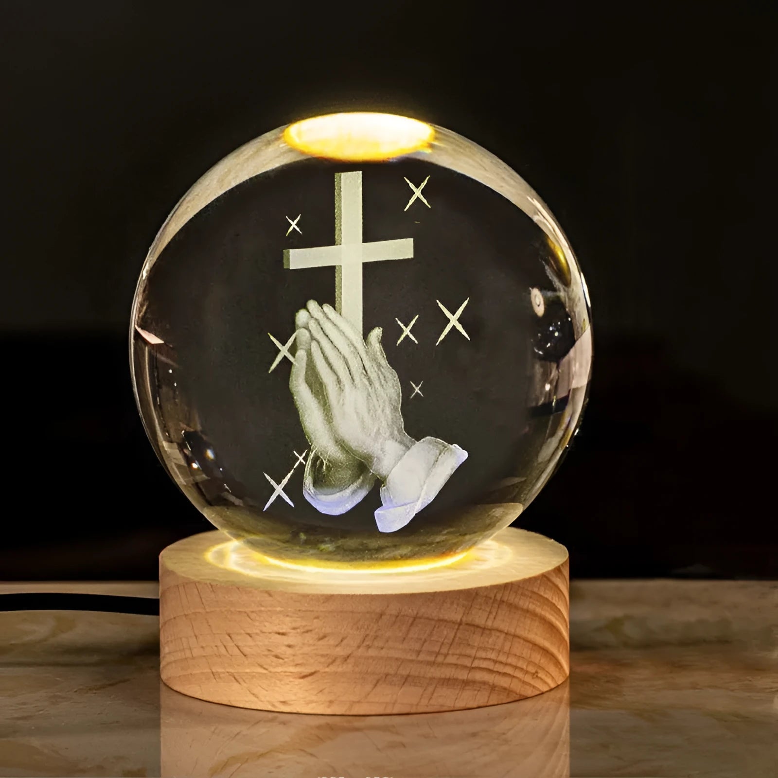 6cm white crystal ball desk ornament with laser-engraved cross design on a solid wood warm light base.