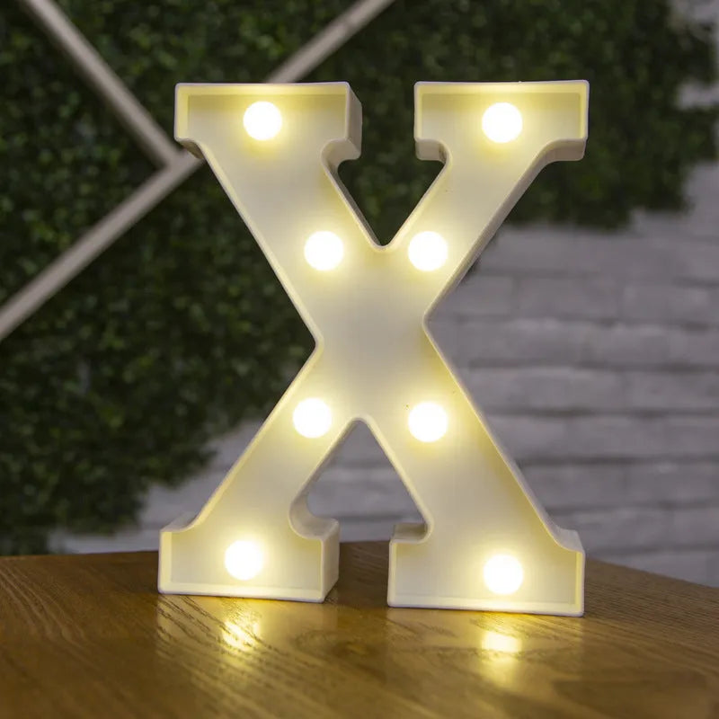 White plastic LED marquee letter sign with warm white glow, 22cm tall