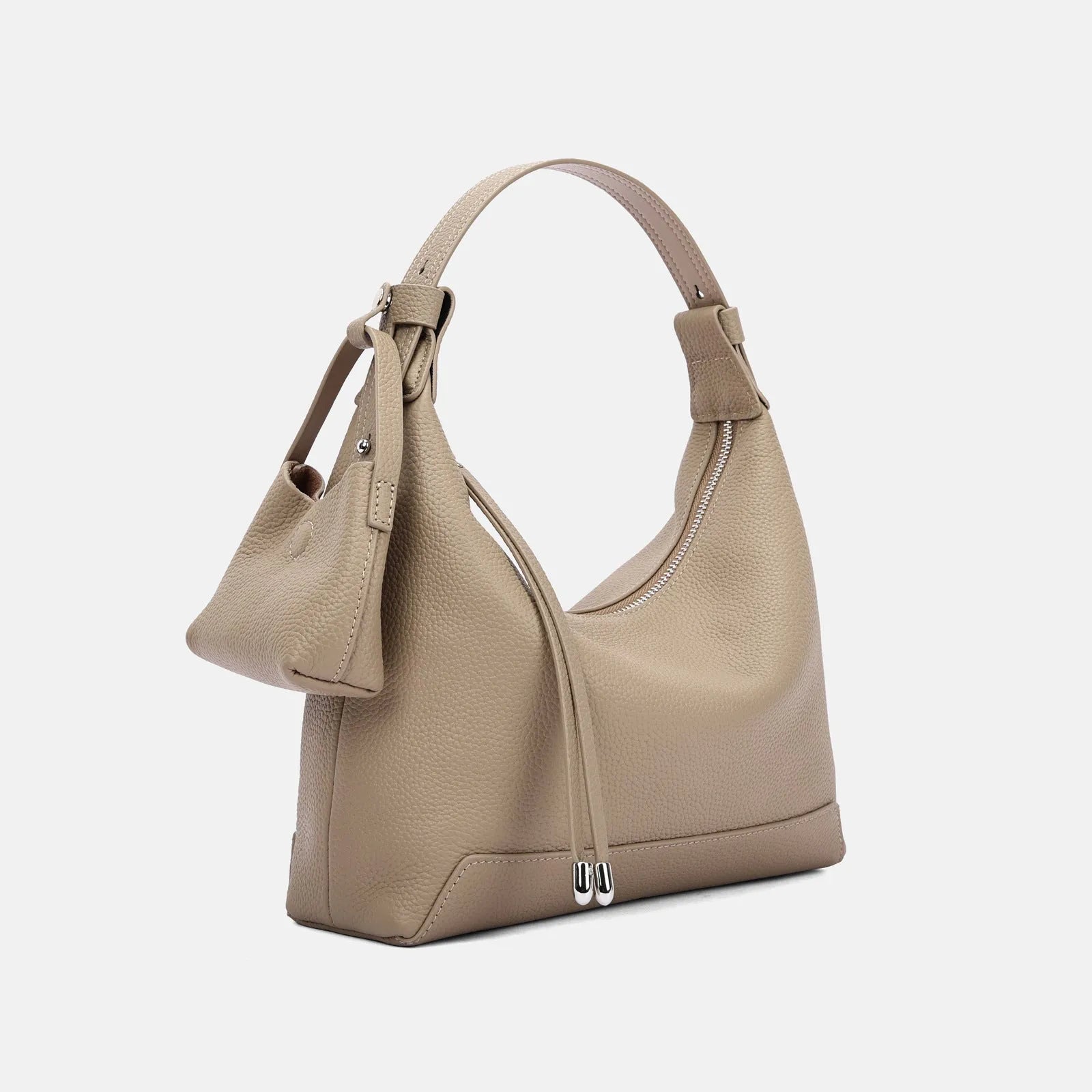 Genuine cowhide leather women's shoulder bag in urban simplicity style, shown in soft construction.