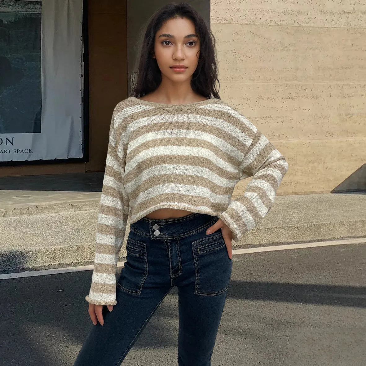 Striped long-sleeved cotton sweater shown wearable front and back, in black, pink, khaki, blue, or navy blue.