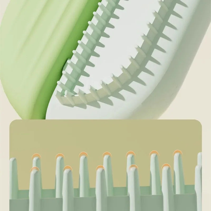 Blue pet grooming comb with water tank for collecting hair during brushing of dogs and cats.