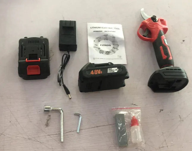Electric pruning knife with lithium battery and plastic storage box containing two batteries and charger