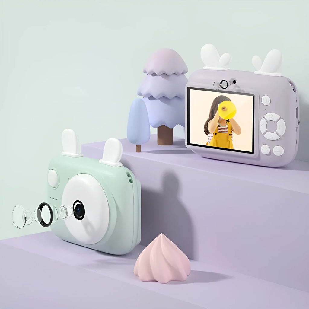 A2 Kids Macaron style digital camera in choice of colours, showing compact design with lens and 2.4-inch screen.
