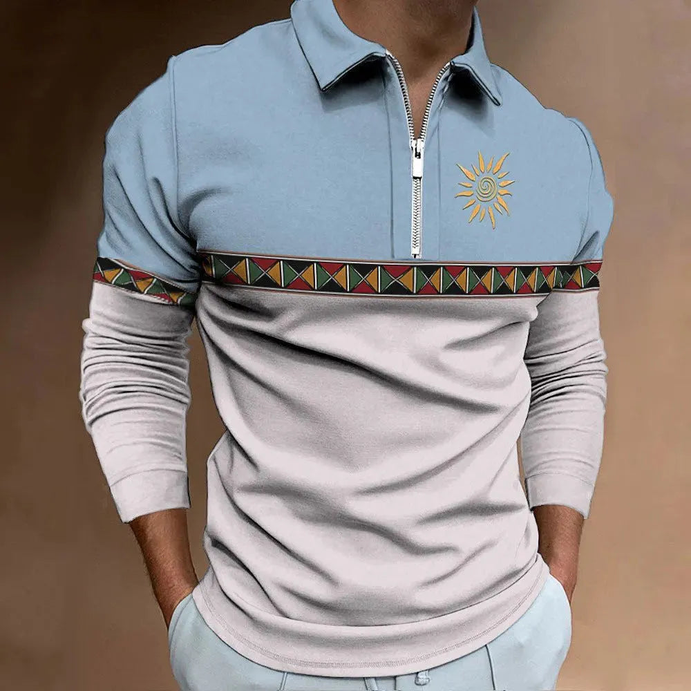 Man wearing a long sleeve loose fit t-shirt with a retro striped print and zip detail decorations.
