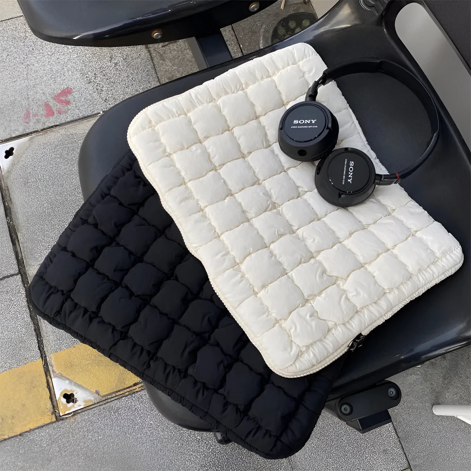 Large capacity cloud cotton nylon laptop bag shown in black and white colour options