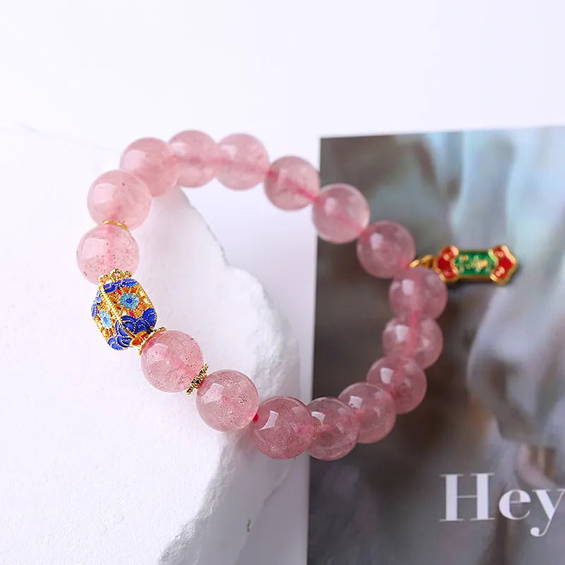 Pink Strawberry Quartz crystal bracelet with hand-woven construction and lucky national style design