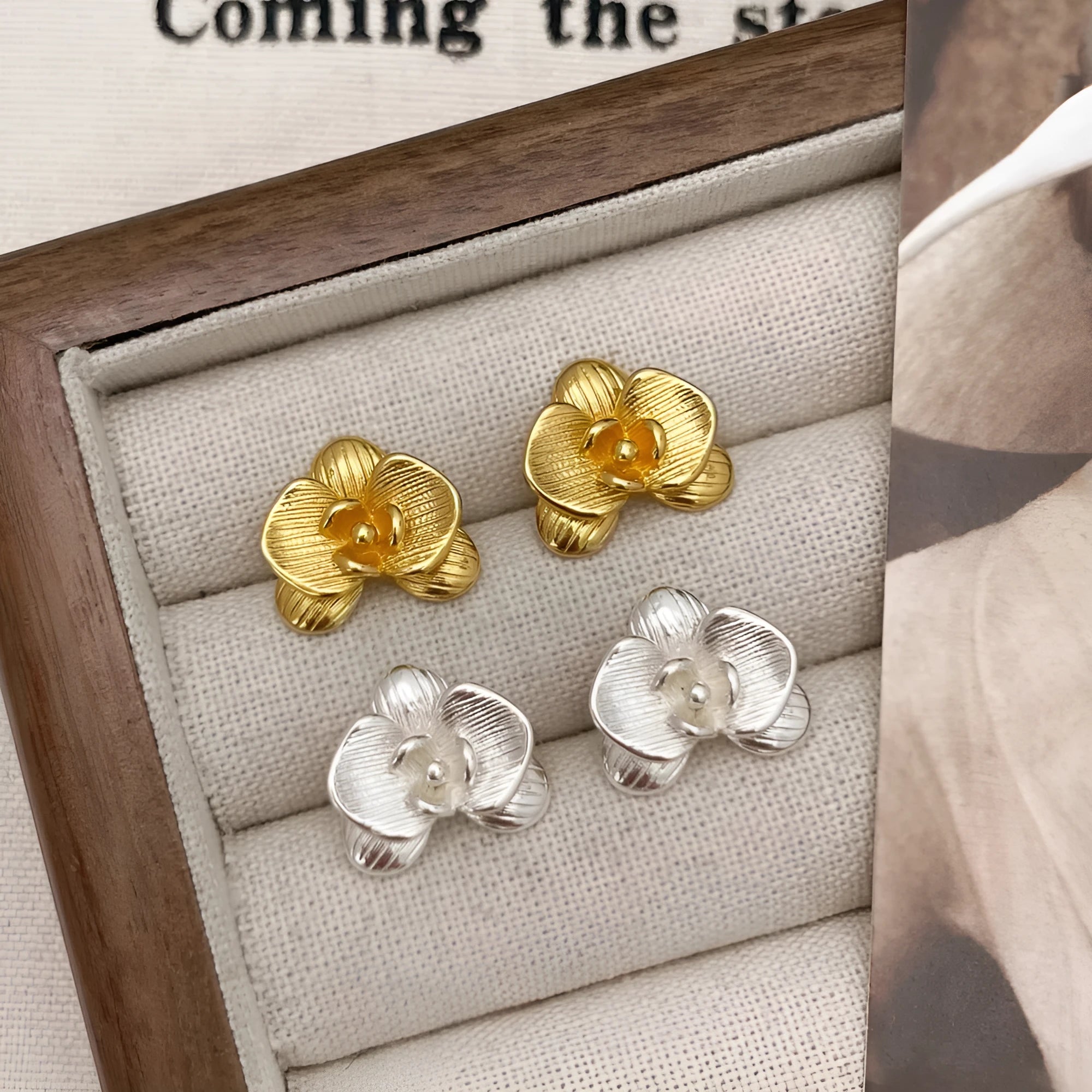 Retro style flower earrings with petal design in gold or silver colour on copper base