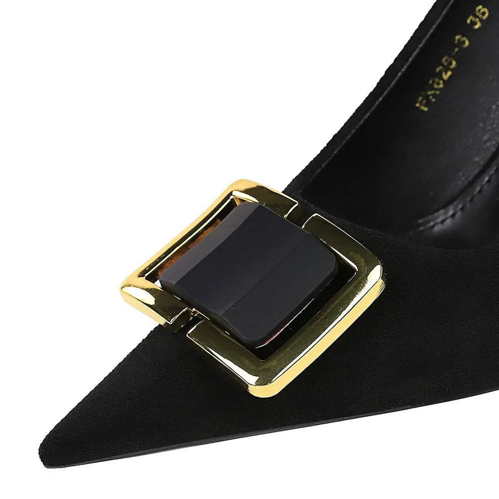 Black suede women's high heel court shoes with a 9cm stiletto heel and pointed toe on a rubber sole.