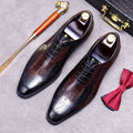 Men's formal leather shoes in brown with pointy toe, cowhide upper, and rubber sole, displayed on a neutral background.