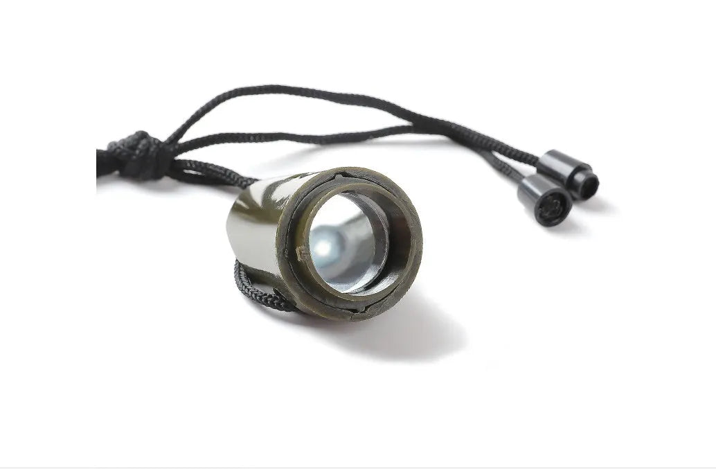 Outdoor Professional Seven-in-one Multifunctional Survival Whistle in army green with compass and whistle features