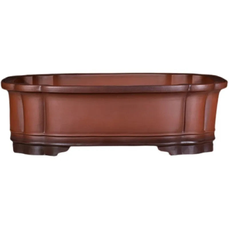 Large antique-style rectangular purple clay flowerpot for garden trees and plants.