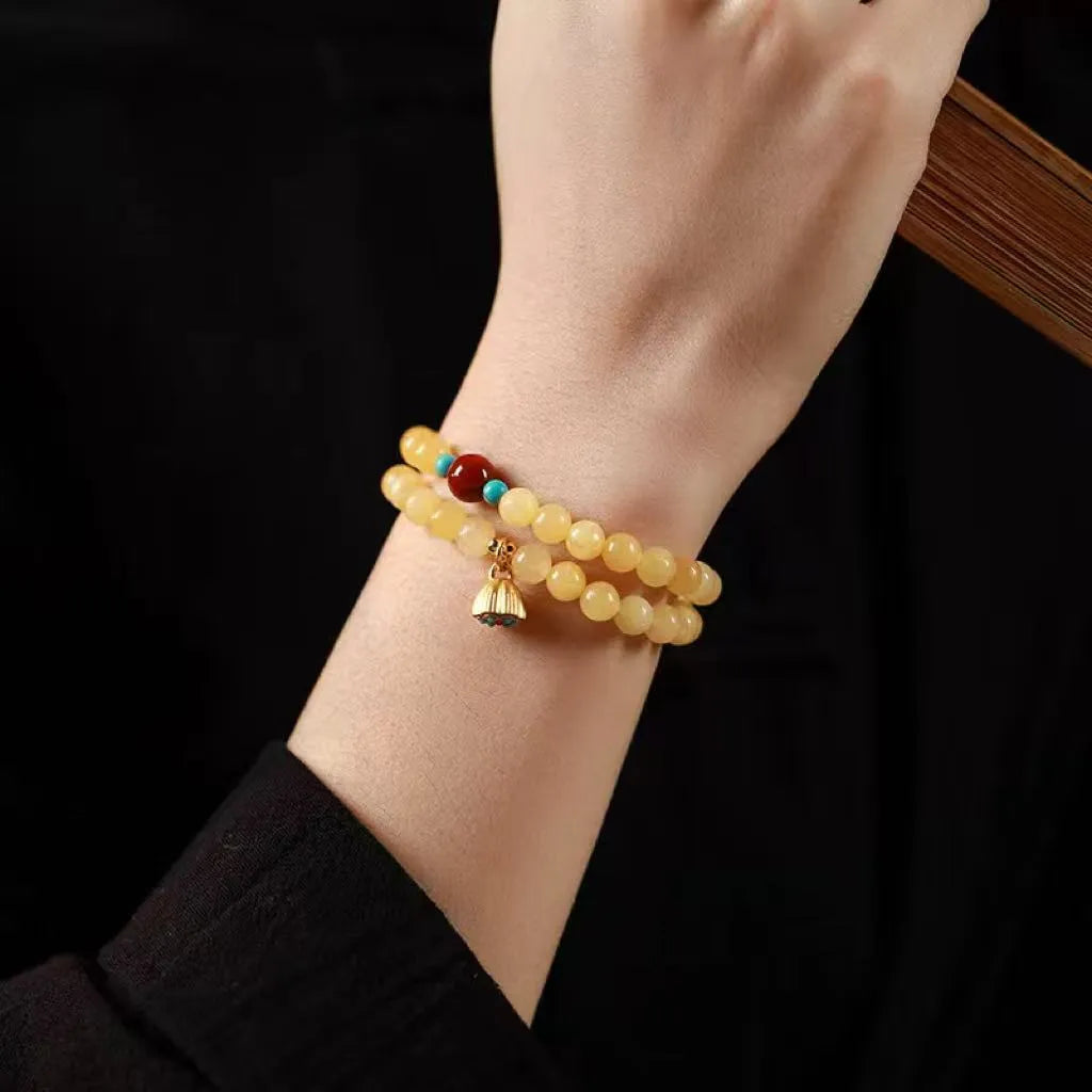 Handmade double ring bracelet for women with yellow jade and topaz stones in a retro design.