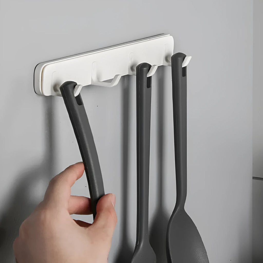 Four-row pull-out gap hook made of ABS plastic with U-shaped hooks and non-marking stickers for kitchen bathroom bedroom behind door storage
