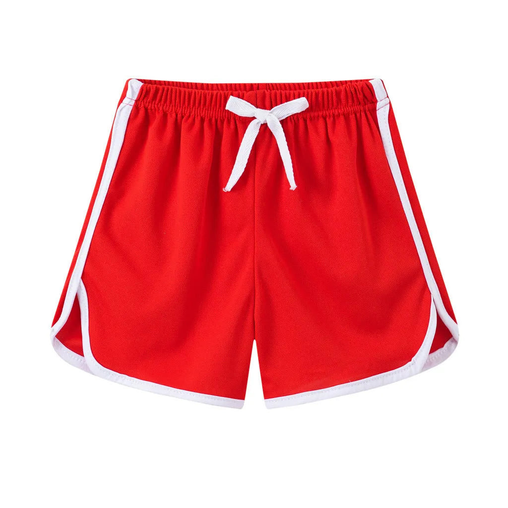 Children's polyester holiday shorts in multiple colours and patterns with height sizing from 100 to 140cm