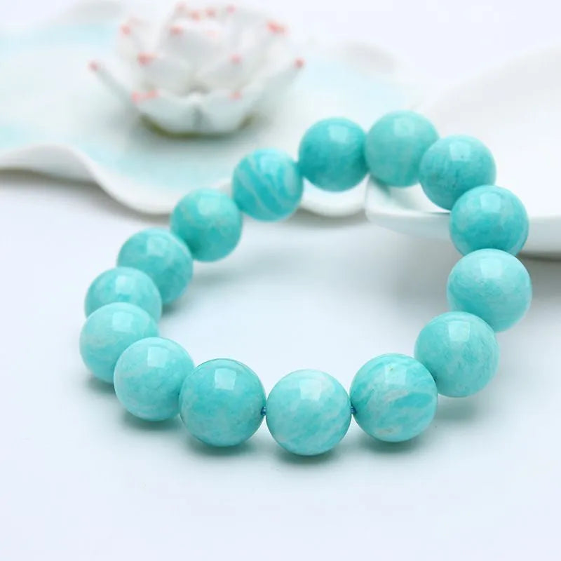 Amazonite gemstone bracelet showing natural blue-green beads in one of three available sizes: 8mm, 9mm or 10mm diameter