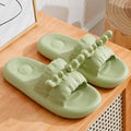 White EVA flip flop slippers with a cute deer horn design and a non-slip sole.