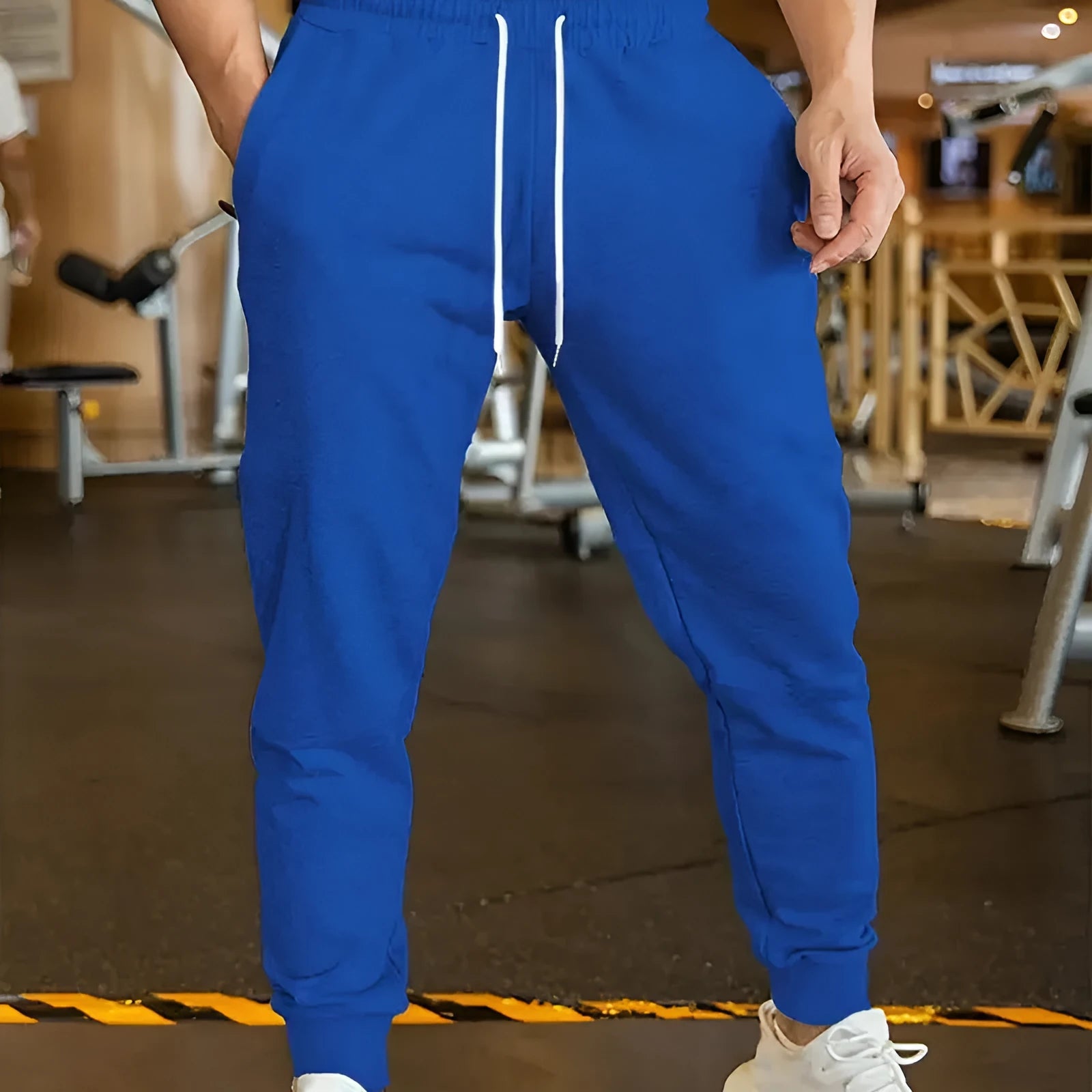 Men's polyester linen leisure trousers with drawstring waist and elasticated calf in loose fit design