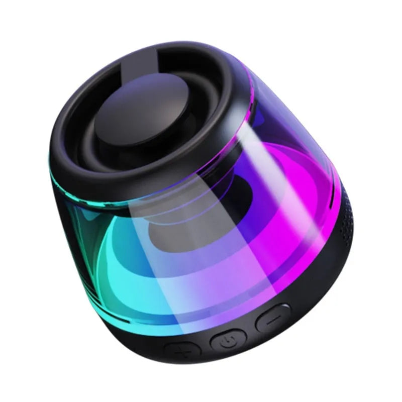 Portable Bluetooth speaker with magnetic base and ambient lighting in black or white