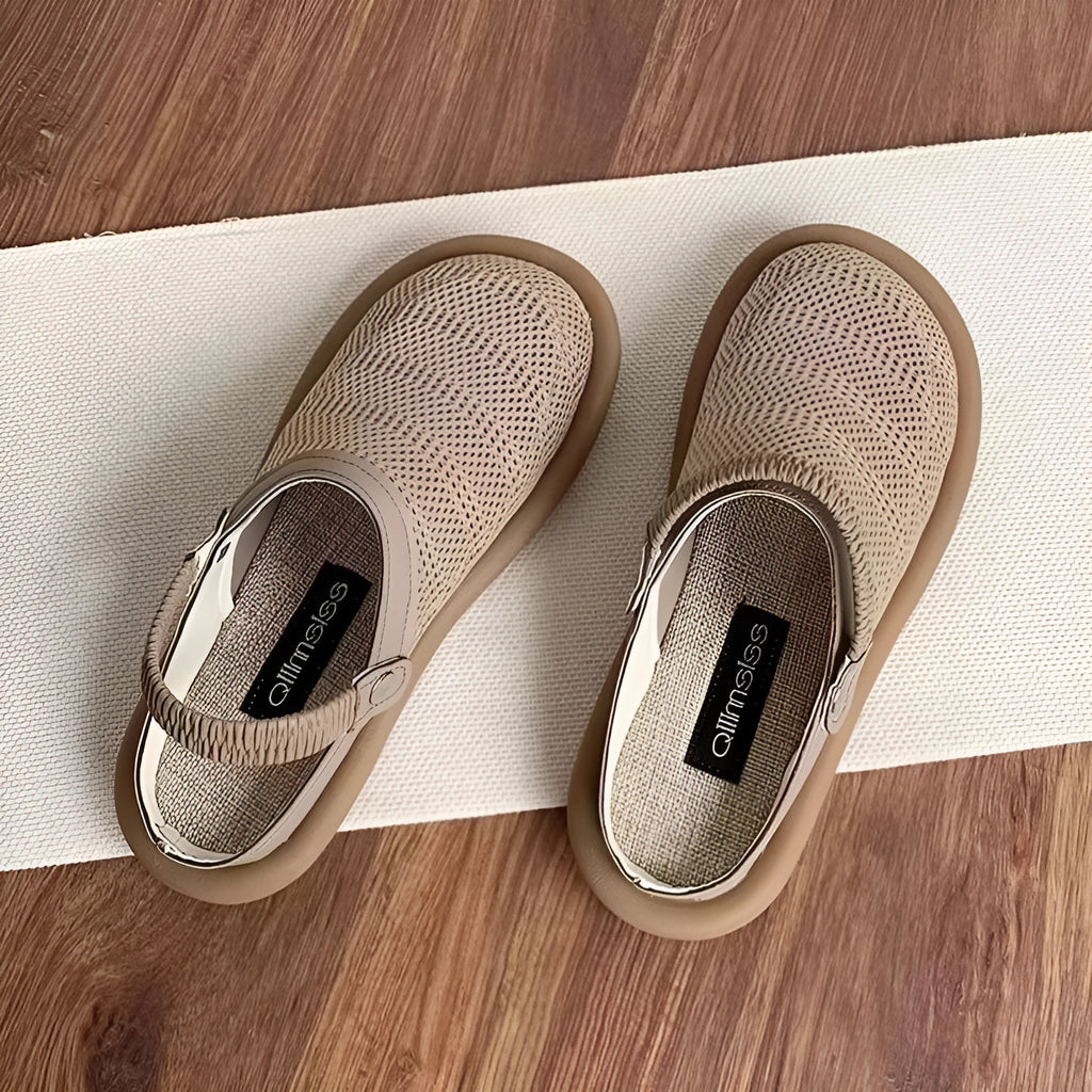 Beige Mori girl style slip-on shoes with a round toe and linen upper on a soft rubber sole.