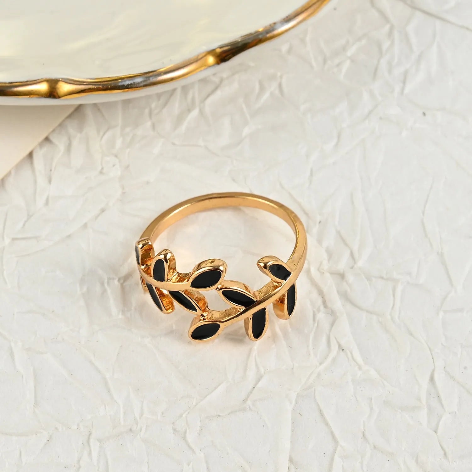 Gold electroplated acrylic fashion ring with geometric leaf design in floral shape for women