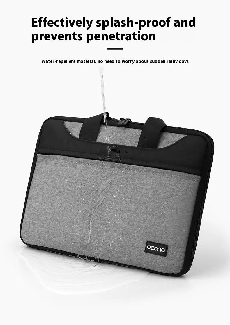 Black Oxford cloth laptop bag with a soft carry handle for business travel.