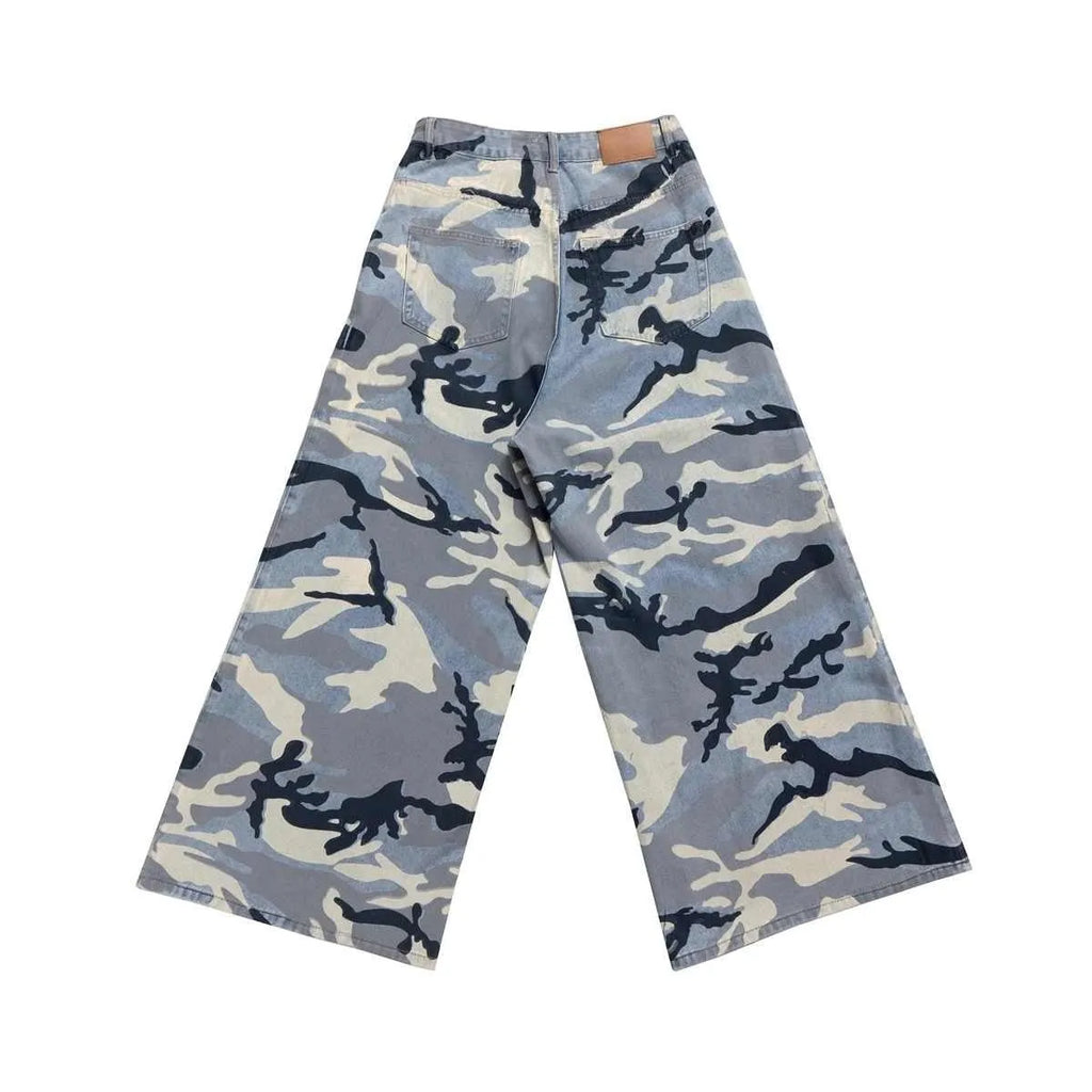Snow camouflage blue loose-fit jeans with a mid waist on a neutral background.