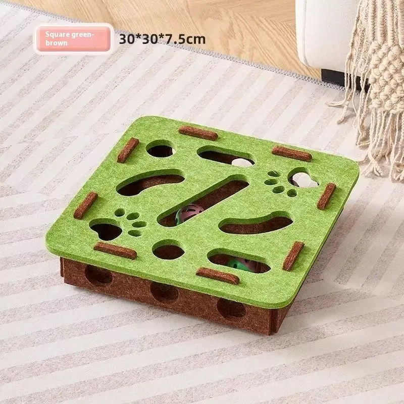 Felt box cat toy with holes for paw exploration in green brown colour