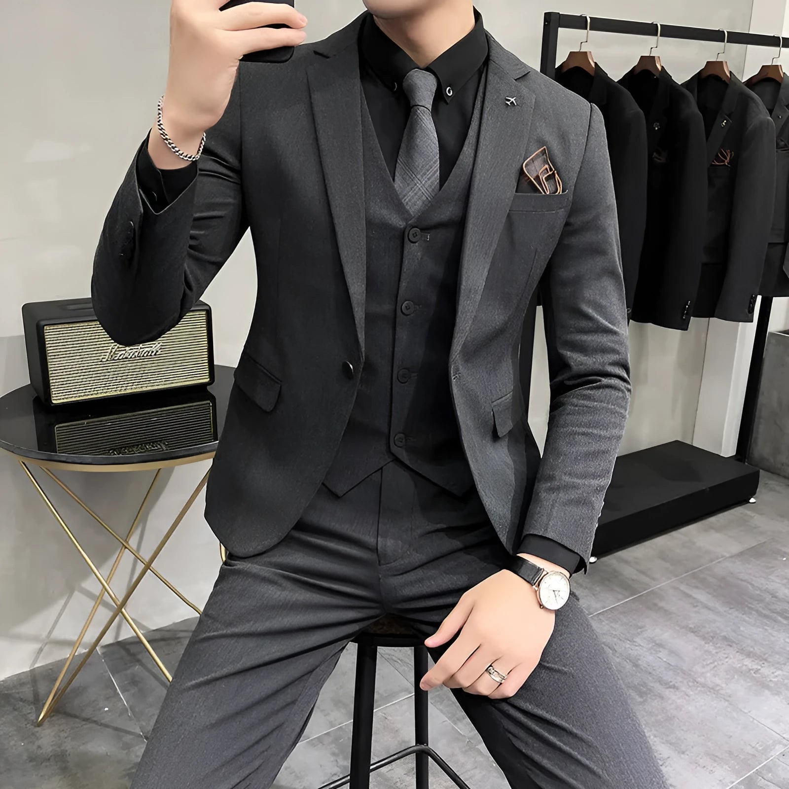 Men's slim fit casual suit set in black, three-piece, with slim tie, full body view