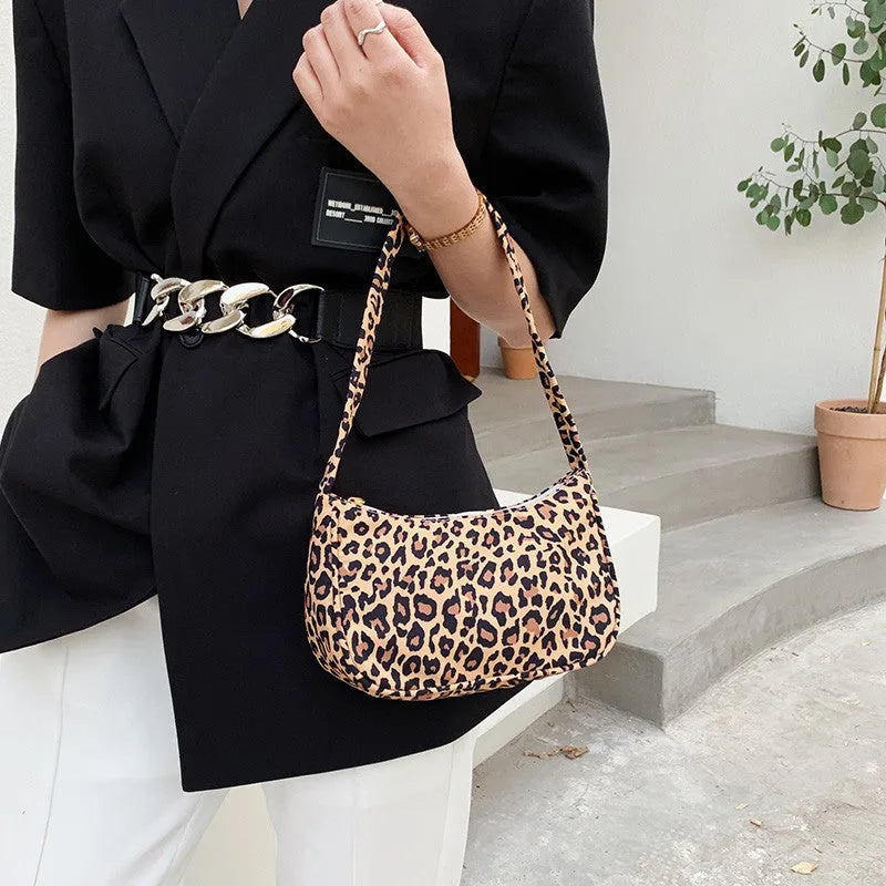 Women's small nylon underarm bag with leopard print pattern and zipper closure, 23cm size