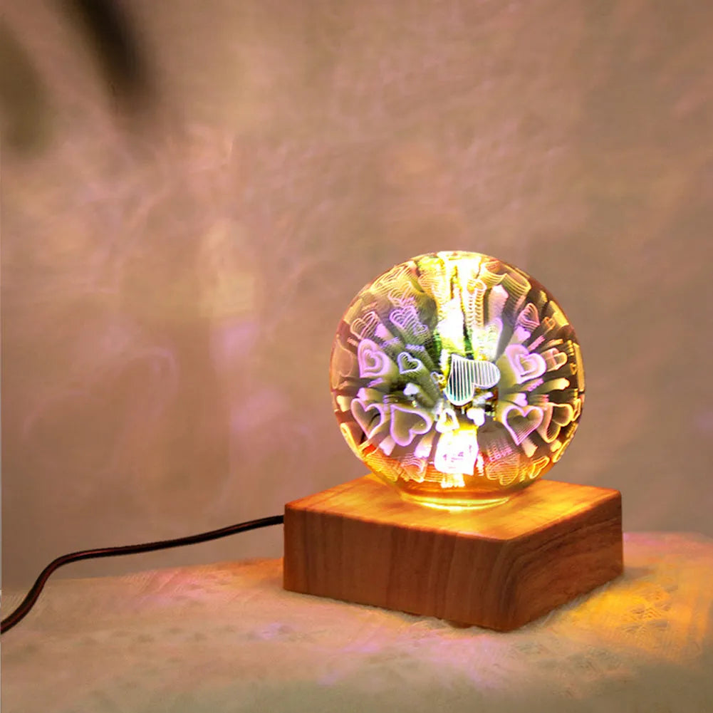 USB plug-in crystal ball night light displaying colourful firework pattern on a dark surface.