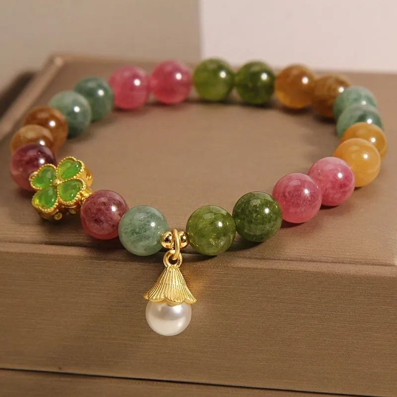 Colourful tourmaline bracelet with four-leaf clover pearl pendant in geometric drop shape