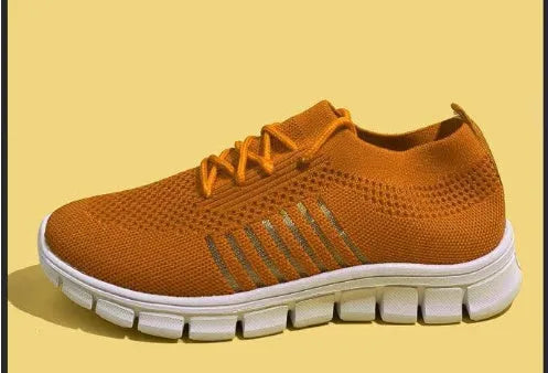 Women's breathable high-top lace-up platform sneaker in various colours on a casual background.