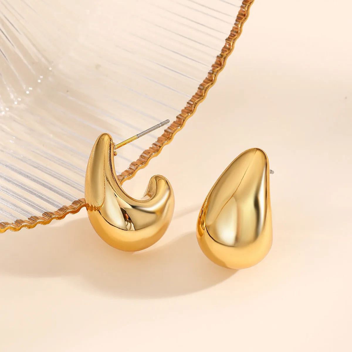 Acrylic geometric water drop earrings with electroplated glossy finish, simple style