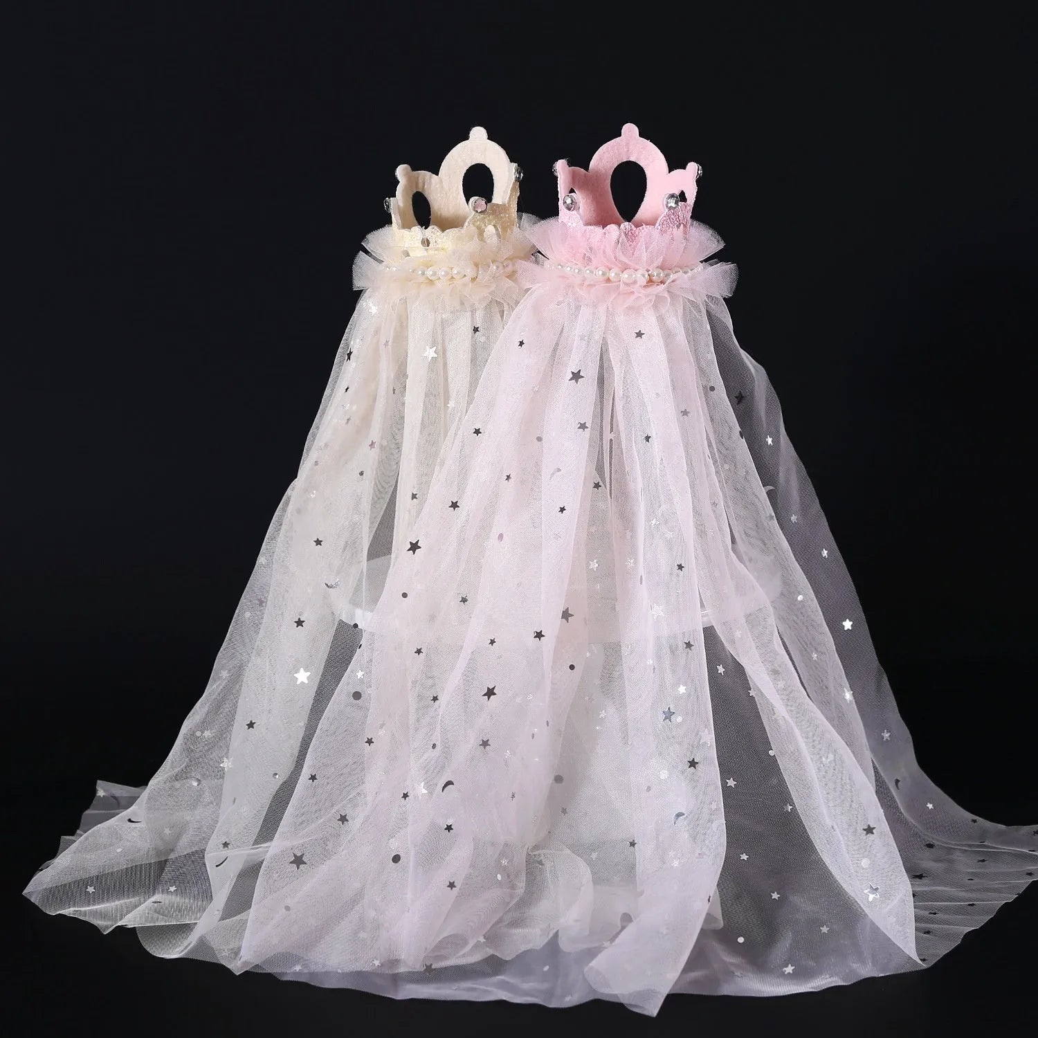 A cat wearing a princess crown headdress with a soft veil, available in beige or pink.